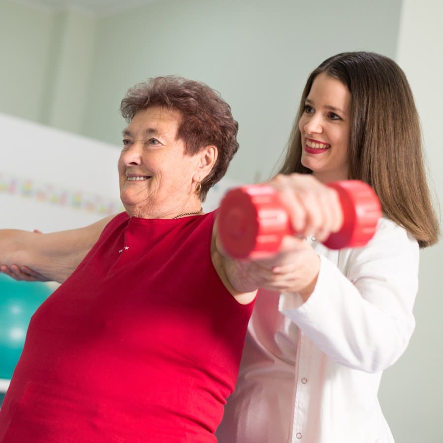 Edition of Saginaw | Senior woman exercising with caregiver